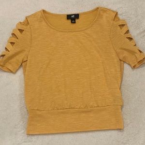 This is a size XS yellow shirt it is from the brand IZbyer